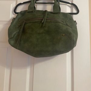 Olive green bucket faux leather chicos. Inside and outside piockets. Never used